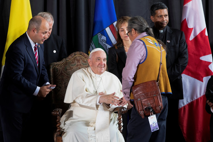 Pope Francis is greeted by Assembly of First Nations Regional Chief Gerald Antoine at the Edmonton International Airport near Edmonton, Alberta, Canada July 24, 2022.