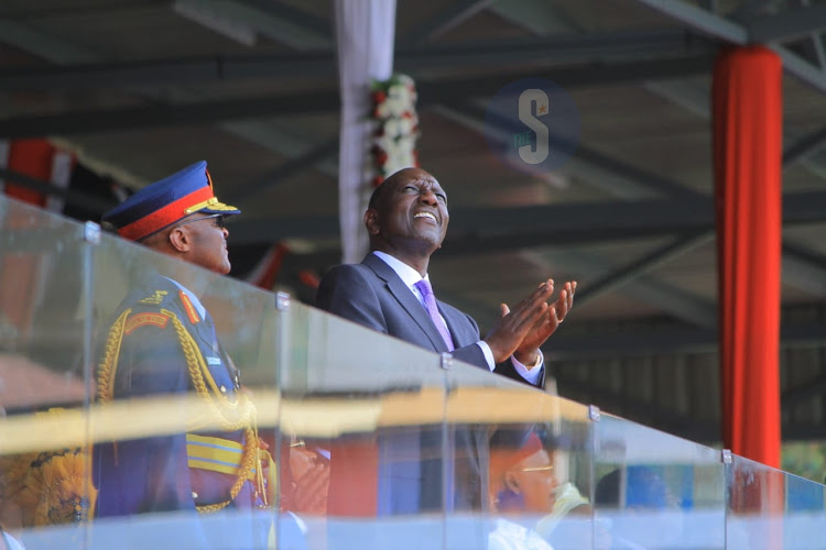 President william Ruto looks at millitary aeroplanes fly during the Madaraka Day celebrations in Embu on June 1, 2023