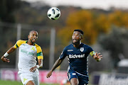 Tiyani Mabunda of Mamelodi Sundowns and Thulani Hlatshwayo of Bidvest Wits during the Absa Premiership match between Bidvest Wits and Mamelodi Sundowns at Bidvest Stadium on February 23, 2019 in Johannesburg, South Africa. 