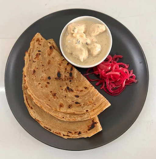 Malai Chicken With Lachha Paratha And Onion Salad