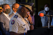 Head of Haitian National Police, Leon Charles, pauses during a news conference following the assassination of President Jovenel Moise, in Port-au-Prince, Haiti July 11, 2021. 