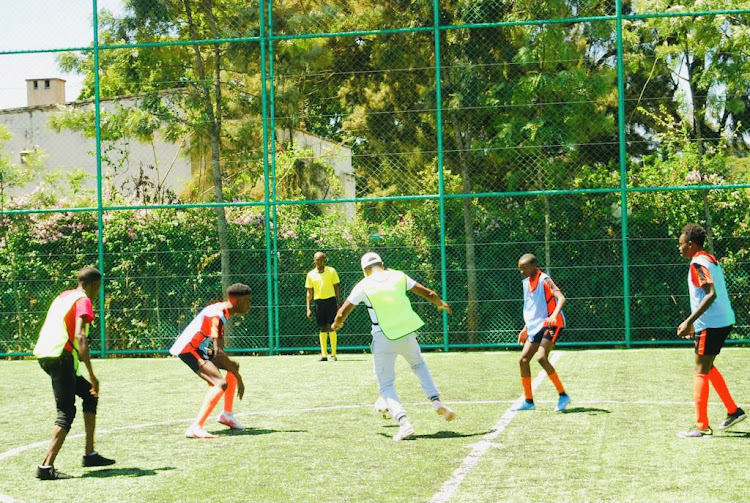 CAS Foreign affairs Ababu Namwamba having a thrilling weekend of sporting fun at the Kings Junior Soccer Academy.