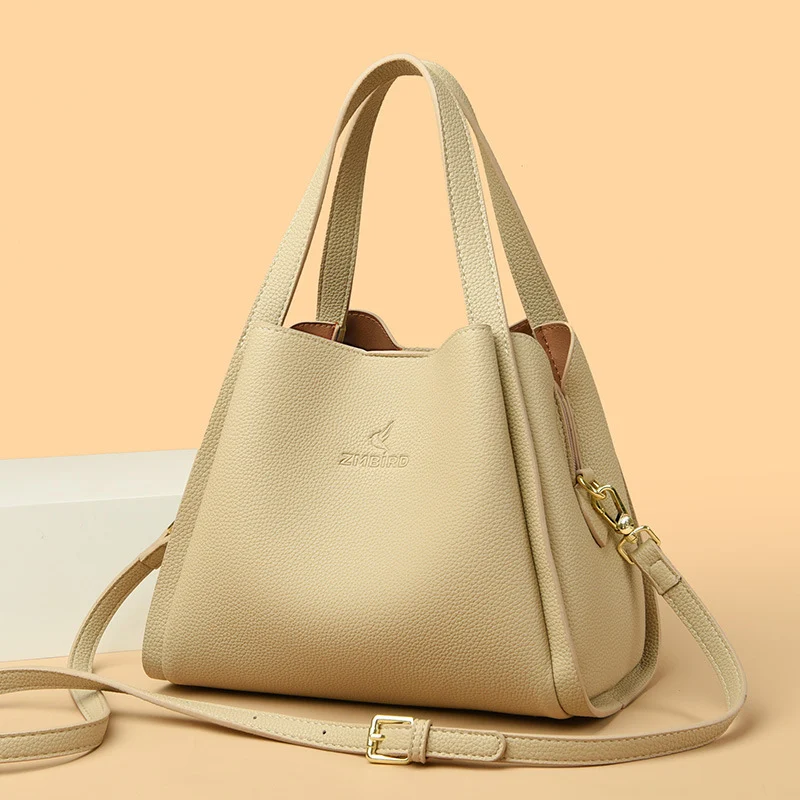 Bolsa de ombro feminina elegante, ideal para o dia a dia e trabalho. Couro vegetal, padrão e estilo casual.