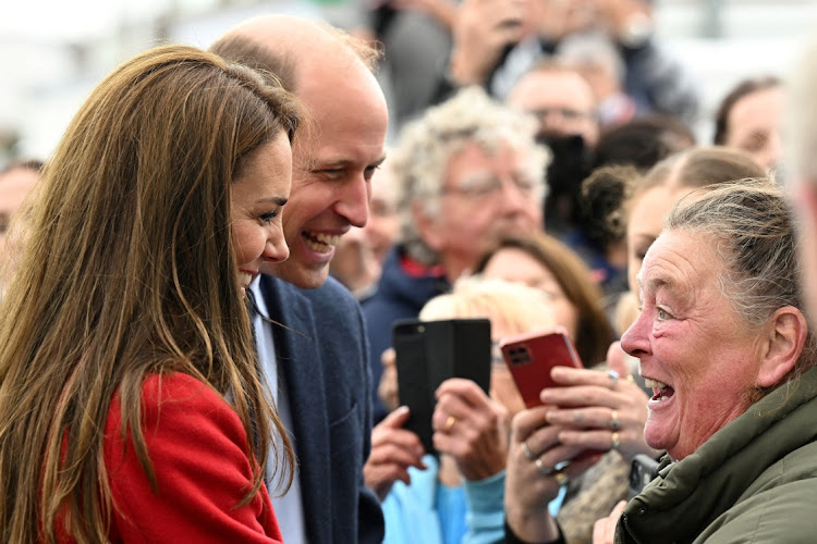 Britain's Prince William and Catherine meet members of the public following a visit to the Royal National Lifeboat Institution in Wales.