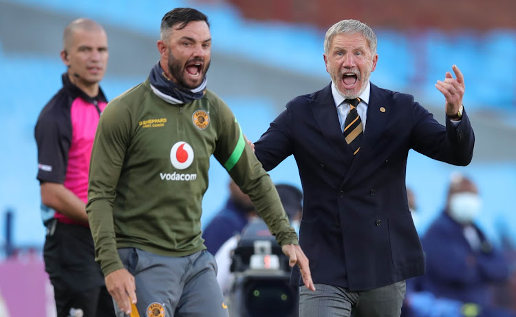 Dillon Sheppard, assistant coach of Kaizer Chiefs, and Stuart Baxter, coach, react during the DStv Premiership match against Mamelodi Sundowns.