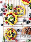 Braaied donuts with lemon curd and mixed berries.