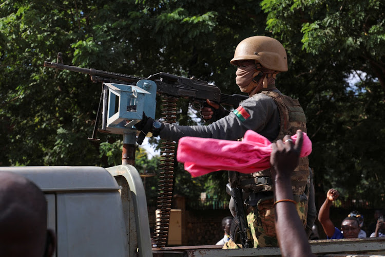 New junta's soldiers stand guard in an armoured vehicle in Ouagadougou, Burkina Faso. File photo: VINCENT BADO/REUTERS