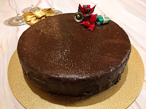 A moist and decadent Chocolate Beet Cake topped with ganache.