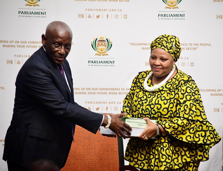 Justice Sandile Ngcobo presents the Section 89 report to The Speaker of Parliament Nosiviwe Mapisa-Nqakula.