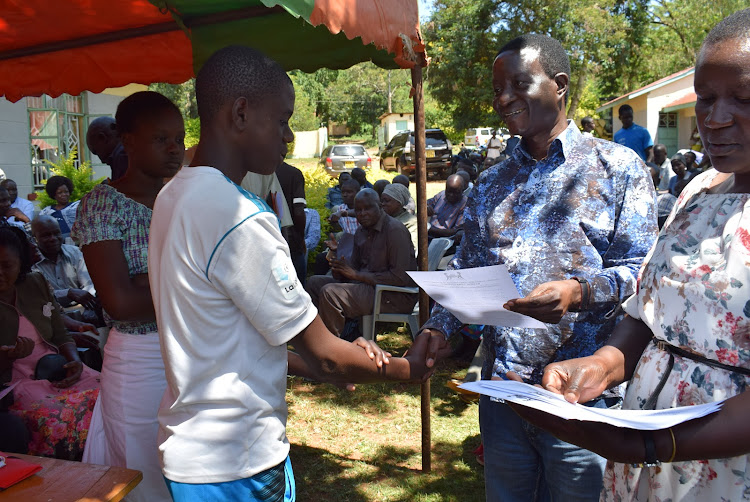 Kasipul MP Ongondo Were hands over commitment letters to students set to join Form One on Saturday. Some 300 students benefited from Sh3 million bursary from the National Government Constituency Development Fund,