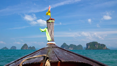 Head over to Hong Island by longtail boat