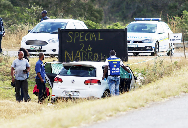 Anslin (grey T-shirt), father of slain boxer Leighandre ‘Baby Lee’ Jegels, was also at the scene following the shooting of his daughter.