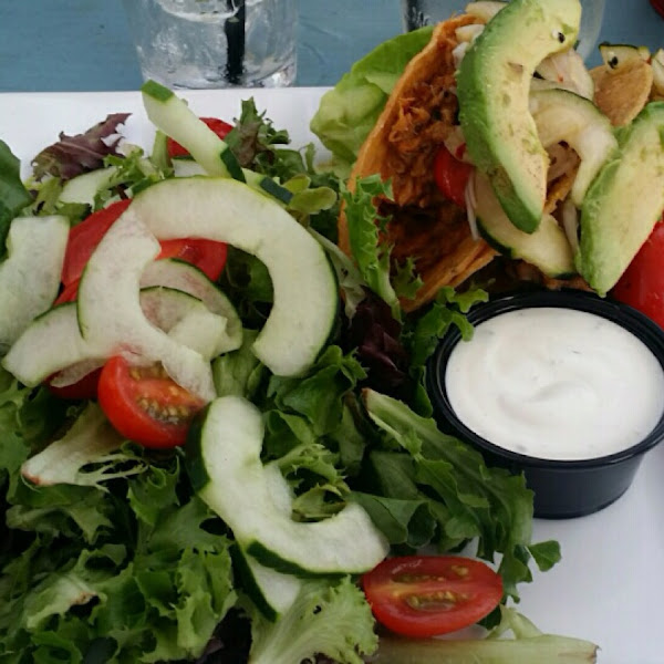 BBQ pork tacos with avocado, and chipotle sour cream.  Side salad.