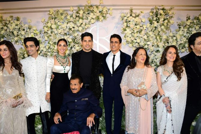 Mr. and Mrs. Malhotra with their family