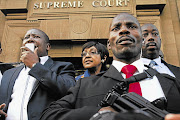 ANCYL president Julius Malema, and ANC stalwart Winnie Madikizela-Mandela outside the court where he appeared  for singing the 'Dubul'ibhunu (Shoot the Boer)'. File photo.