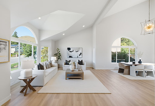 Spacious living room with large arched windows in this luxury house for sale in Fremont ($3,598,000)