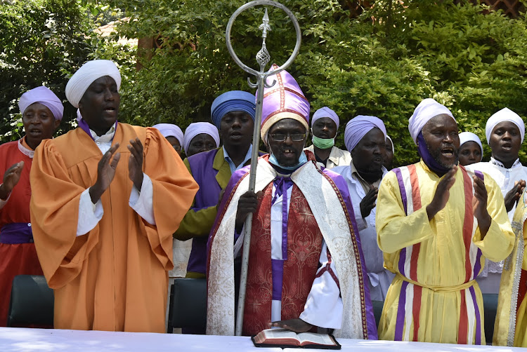 Akorino clerics led by Bishop Johanna Ndirangu (C) during their meeting in Thika on Tuesday.