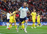 England's Harry Kane celebrates scoring their first goal in the Euro 2024 Group C qualifier against Ukraine at Wembley Stadium in London on March 26 2023.