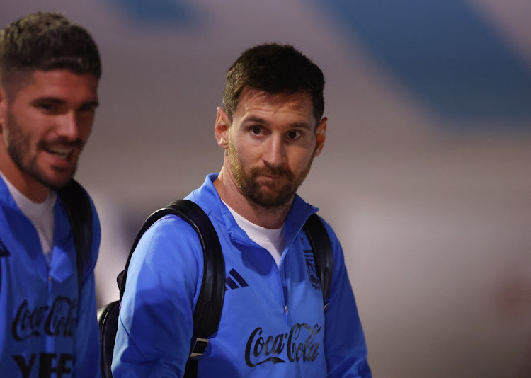 Argentina's Lionel Messi arrives in Doha with Argentina's Rodrigo De Paul for the FIFA World Cup Qatar 2022.