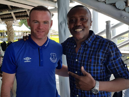 Wayne Rooney and Maina Kageni pose for a photo after meeting up in Tanzania. Photo / COURTESY