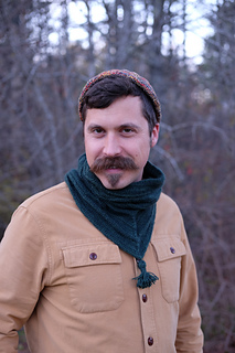 man wearing knit cowl with tassel