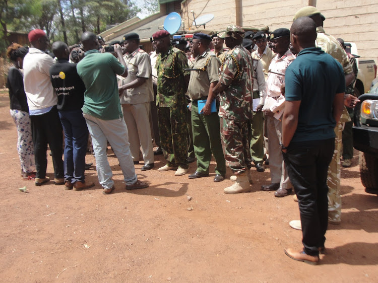 The Marsabit multi-agency team led by County Commissioner Paul Rotich during a joint disarmament desensitization at Marsabit town on Wednesday, May 18, 2022