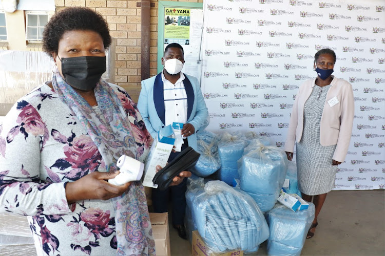 Health MEC Sindiswa Gomba, with St Barnabas Hospital CEO Nombulelo Nobanda and chief medical officer Dr Vusumzi Mehlo at the Libode-based hospital in Ntlaza on Friday. Gomba was there to deliver personal protective equipment.