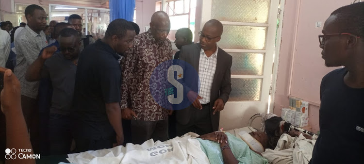 Kenyatta University Vice Chancellor Paul Wainaina and ther officials visiting injured students at the Moi County Referral Hospital ward in Voi, Taita Taveta on March 19, 2024.