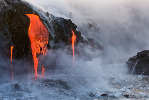 Lava from the Kilauea Volcano eruption in Hawaii entering the pacific ocean.