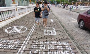 A ‘mobile phone lane’ on a street in a theme park in Chongqing, China.