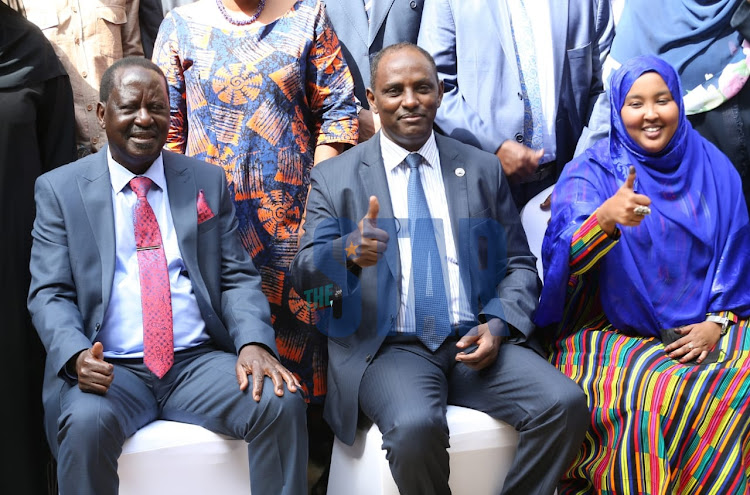 ODM leader Raila Odinga confers with National Treasury CS Ukur Yatani after meeting leaders from the Arid & Semi-Arid Lands (ASALs) in Nairobi on January 19, 2022.