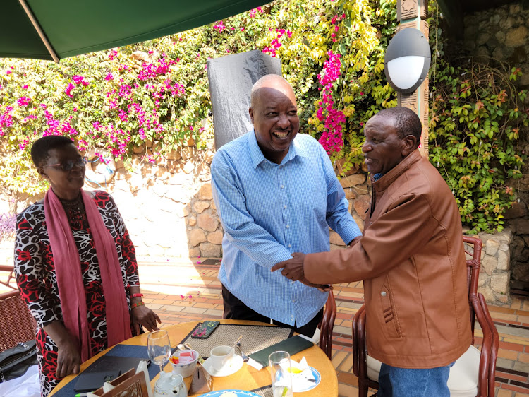 Nyamira Governor Amos Nyaribo (c) with Sports Minister Grace Nyamongo and Gusii Sports Legends Director Alfred Momanyi. .