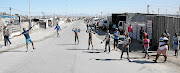 Khayelitsha residents out and about during the lockdown. The Cape Town township has seen a drop in infections among health workers, and a decline in hospitalisations and  deaths.  
