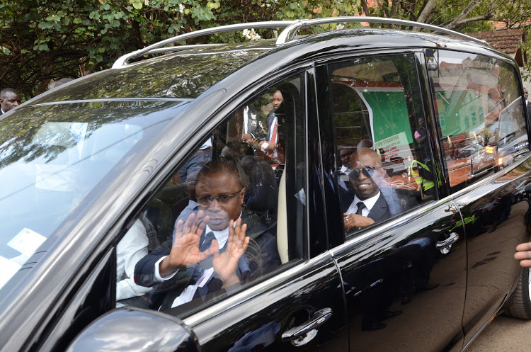 Edwin Abonyo and Bryan Abonyo, widower and son of Bomet Governor Joyce Laboso, are driven with the coffin from All Saints Cathedral, Nairobi, on Thursday