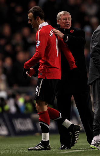 Dimitar Berbatov of Manchester United is substituted by Manchester United Manager Sir Alex Ferguson during the Barclays Premier League match between Manchester City and Manchester United at the City of Manchester Stadium on November 10, 2010 in Manchester, England