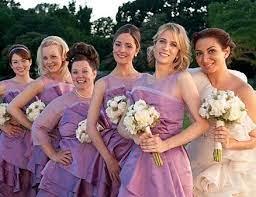 A group of women in dresses  Description automatically generated with low confidence