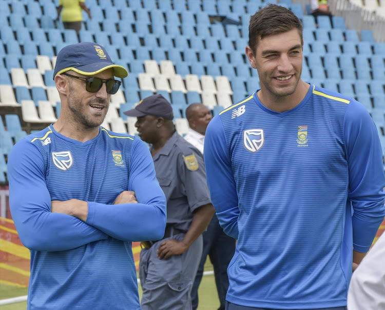 Proteas captain Faf du Plessis (L) stands alongside man of the match Duanne Olivier (R) at the presentations after day 3 of the 1st Castle Lager Test match between South Africa and Pakistan at SuperSport Park in Centurion on December 28, 2018.