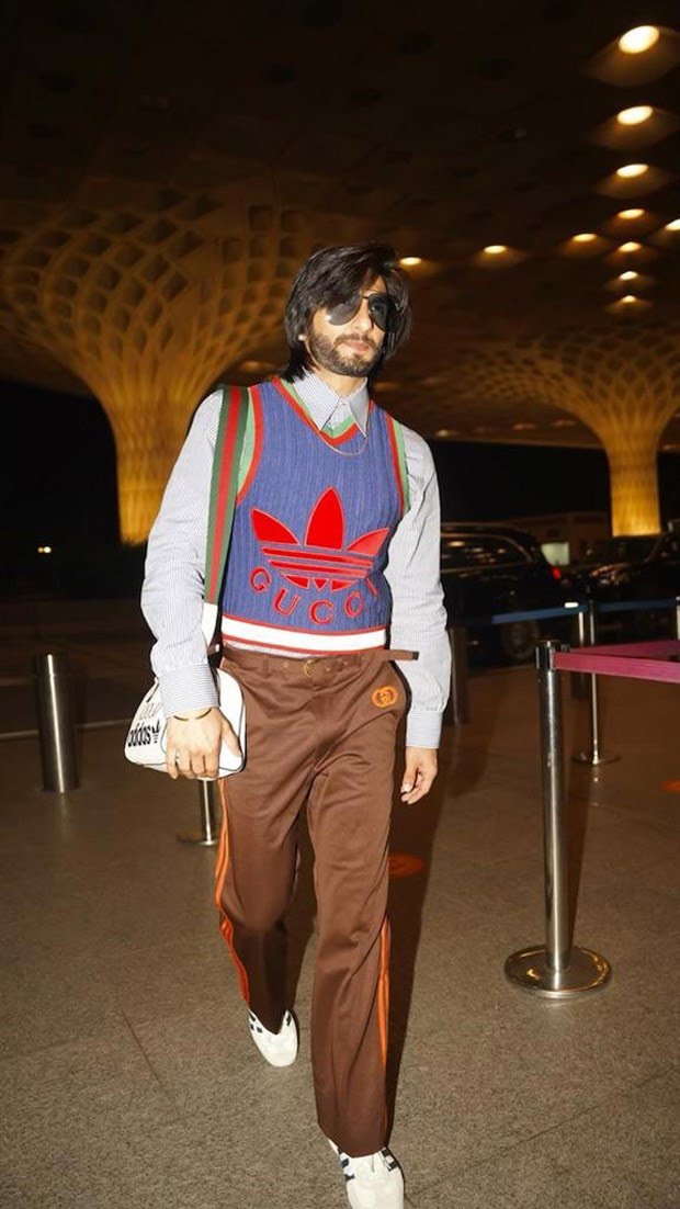 Ranveer Singh departs India flaunting high-end fashion