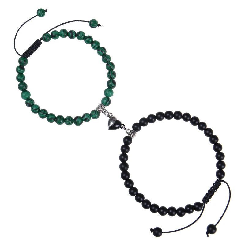 Bracelet couple aimant cœur, pierre noire mate à succion. Un lien unique, une attraction irrésistible pour votre amour.