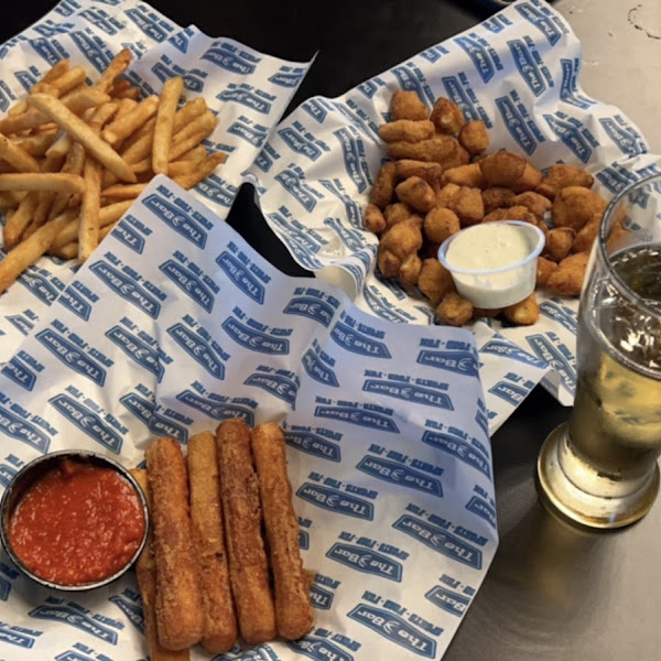 Mozz sticks, cheese curds and fries. She did let us know the curds were a little overcooked and could redo if wanted but they were delicious as is