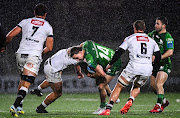 John Porch of Connacht is tackled by Marnus Potgieter of the Sharks during the United Rugby Championship match at The Sportsground in Galway on Saturday evening.