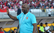 Al Ahly coach Pitso Mosimane gestures during the CAF Champions League final soccer match between Al Ahly and Wydad AC at the Mohammed V Stadium in Casablanca.