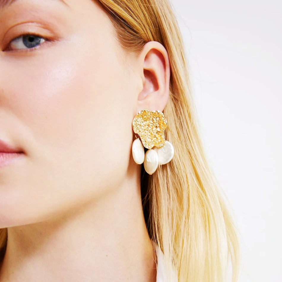 Barok parel oorbellen uit Europa en Amerika. Voeg een vleugje elegantie toe aan je look. Perfect voor elke gelegenheid en stijl.