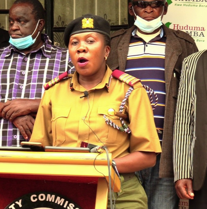 Tharaka Nithi county commissioner Beverly Opwora addressing the media outside her office.