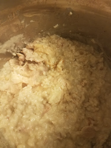 Chicken thighs and rice in an Instant Pot.
