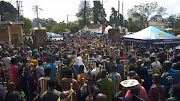 Amabutho stand outside the entrance to the KwaKhethomthandayo Royal Palace in Nongoma on Thursday, demanding to be let inside. 