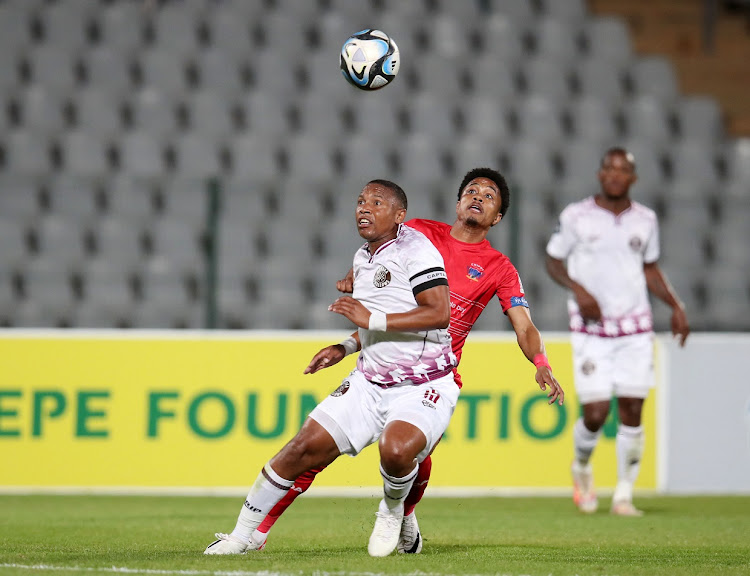 Moroka Swallows' Andile Jali is challenged by Ronaldo Maarman of Chippa United in their DStv Premiership match at Dobsonville Stadium on Wednesday.