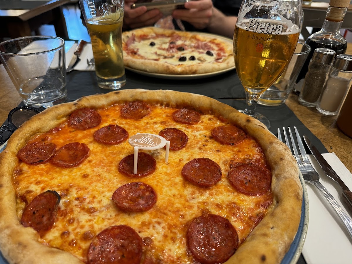 Gluten free salami pizza and gluten free beer