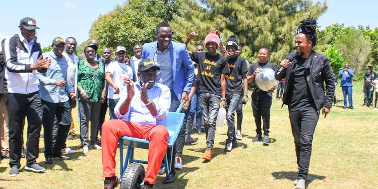 Deputy President William Ruto rides In a wheelbarrow at his Karen residence on September 28, 2020.