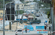 An armoured Personnel Carriers (APC) is seen as Somali military forces secure the streets near the Presidential Palace in Mogadishu, Somalia, December 27, 2021. 